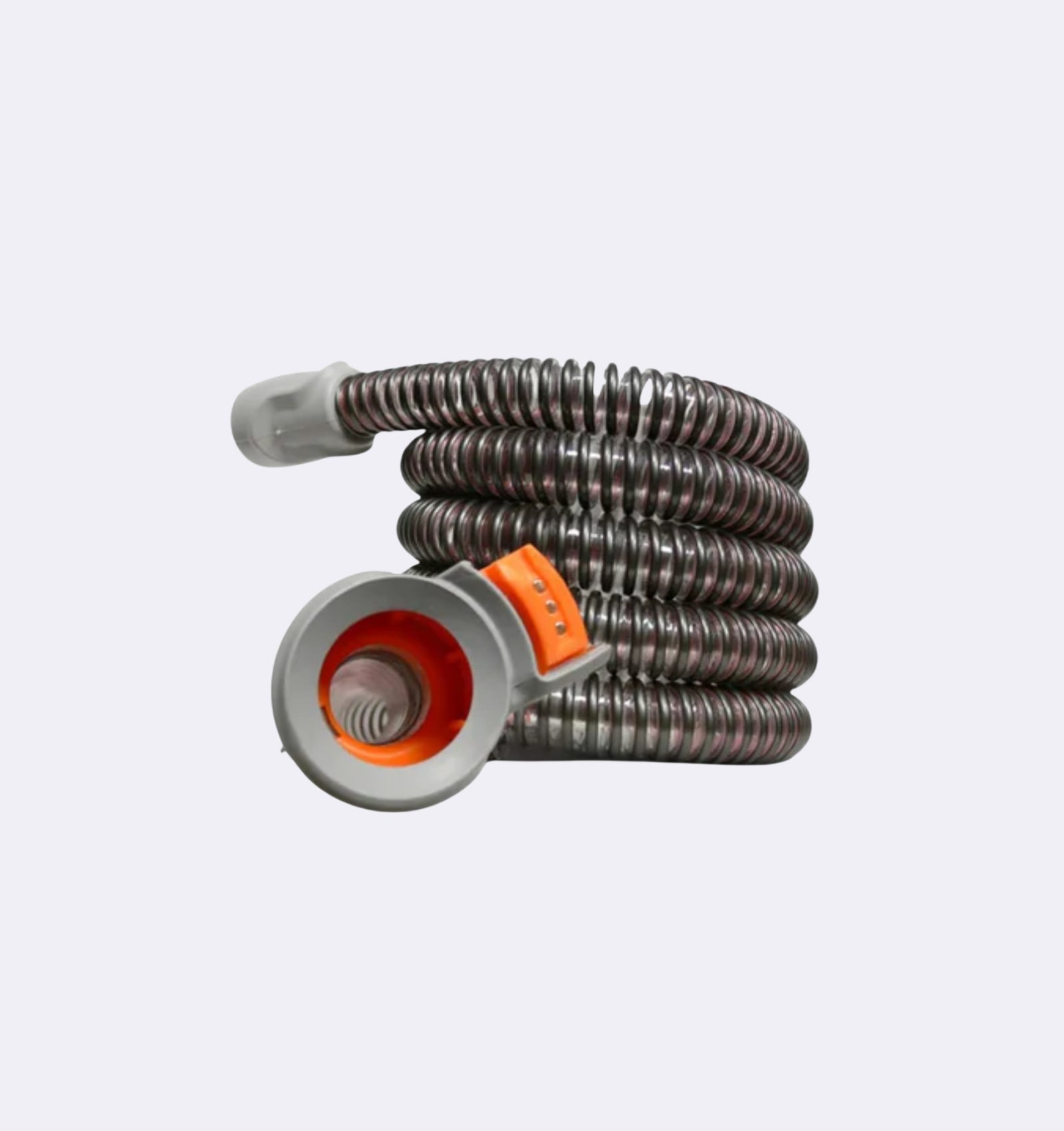 Coiled garden hose with a gray nozzle on a light gray background