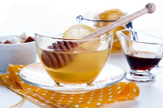 honey and lemon in warm tea